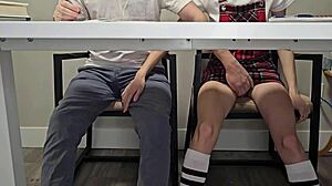 Students Entertaining with Pussy on Desk During Lecture