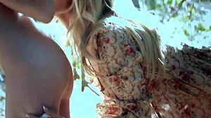 Scarlet Red and Blake Eden enchant with their shaved pussies outdoors