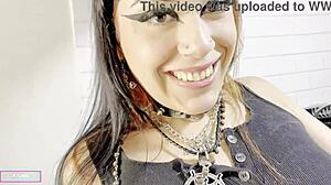 Gothic brunette inserts toy into her big clit pussy!