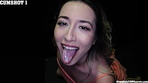 A stunning woman sucks dick expertly at the gloryhole, swallowing cum and getting it on her face