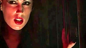 Two lesbian vampires in costumes with stockings and shoes