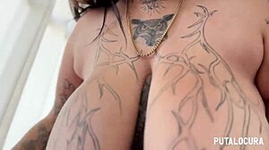 TATTOOED BBW DEEDEE SUCKS COCK BETWEEN HUGE PIERCED TITS