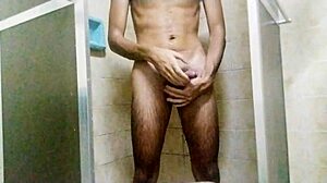 Bathing in the tub while pleasuring herself intensely