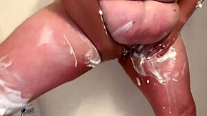 Mature BBW shaves her legs, pussy, and ass seductively