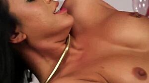 This naughty bombshell gets a wild cumshot on her face