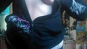 Before she fucks herself, she has to feel her ass and tits