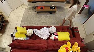 Hot wife welcomes delivery boy for sex on sofa at home