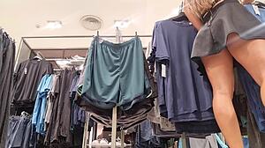 Blonde babe intensely fingers her ass in mall fitting room