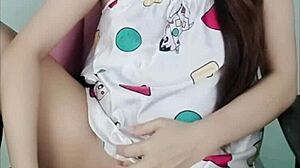 ninew thai girl plays with pussy in uniform costume