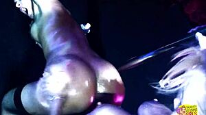 Two horny sluts watch a striptease and decide to fuck the stripper with a strapon