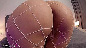Hot brunette in fur coat and fishnet pantyhose fingers her wet pussy with big vibrator