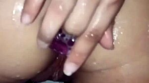 Latina babe enjoys anal play with toys in homemade bathroom session