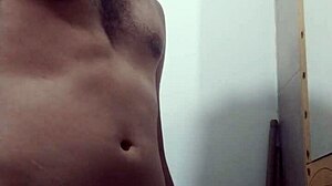 skinny young guy says, 'watch me undress and stroke my big cock in the bathroom'