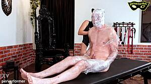 Slave Wrapped In Foil For Humiliation And Domination Punishment