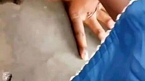 Do you worship her feet in this BDSM outdoor scene?