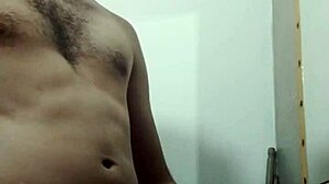 skinny young guy says, 'watch me undress and stroke my big cock in the bathroom'