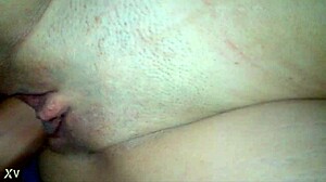 This wet shaved pussy is getting licked by her friend in a homemade amateur scene.