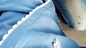 Do you worship her feet in this BDSM outdoor scene?