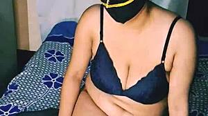 Desi hot Indian girl with big boobs moans while inserting dildo