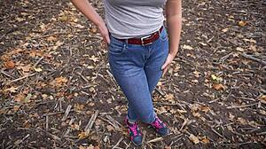 milf teasing her big cameltoe in blue jeans outdoors