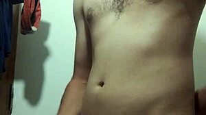 skinny young guy says, 'watch me undress and stroke my big cock in the bathroom'