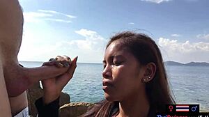 Asian teen girlfriend passionately sucks big cock in public for boyfriend