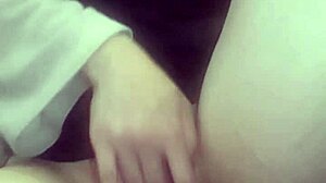 Horny amateur with big tits massages wet pussy in homemade solo