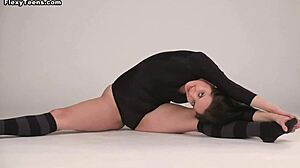 Flexible russian gymnast stretches and shows small tits