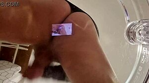 guy shows off his huge cock and ass on transparent chair