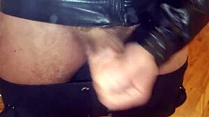 guy shows off his huge cock and ass on transparent chair