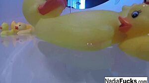 Sexy Nadia Bathes with Rubber Duckies While Masturbating