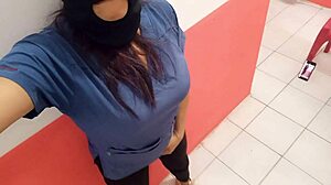 Milf Nurse Shows Ass in Hospital Corridor on Christmas Eve, Horny for Boyfriend.