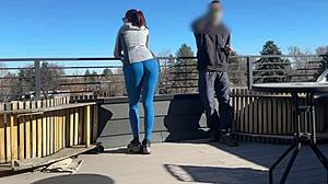 Wow, redhead slut blows big cock on roof!