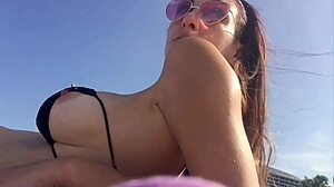Italian milf Artemisia Love flashes her big juicy tits on Florida beach