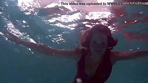 Redhead B Nikita Vodorezova Gets Naked Fast Underwater In Public Pool And Beach