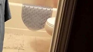 shy young woman takes a relaxing bath in the shower on a quiet morning