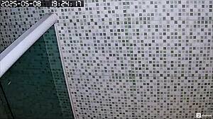 Hidden Camera Captures Busty Brazilian Neighbor Shaving Her Huge Pussy In The Bath