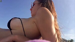 Italian milf Artemisia Love flashes her big juicy tits on Florida beach