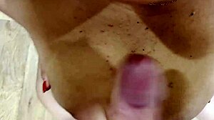 Milf cums hard on big tits, she gasps.