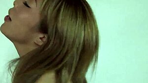 Asian teen with big tits teases vibrator, then gets fucked by big black cock – contrast of innocence and lust.