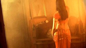 i love those moments when she dances naked, feeling free and exotic, her brunette hair flowing as she strips slowly in soft light.