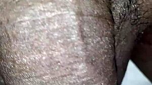 Man plays with huge black monster cock close up