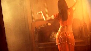 i love those moments when she dances naked, feeling free and exotic, her brunette hair flowing as she strips slowly in soft light.