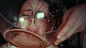 emo bondage whore gets face tied and punished with piss in garage