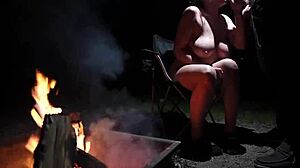 Naked beauty in the forest indulges in outdoor pleasure