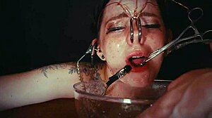emo bondage whore gets face tied and punished with piss in garage