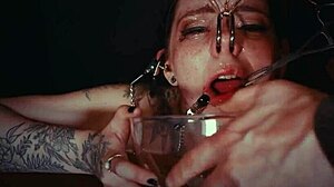 emo bondage whore gets face tied and punished with piss in garage