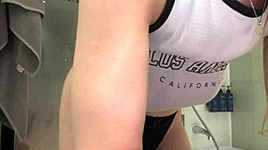 The young amateur girl performs extreme fingering on her wet pussy in the hotel room