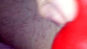 Wearing a latex suit with sheath for the costume event with husband