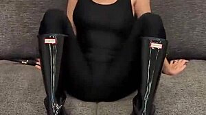 Detailed Look at Black Bodysuit Paired with Black Hunter Boots